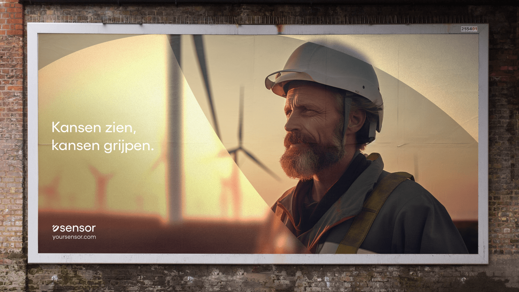 Billboard of a bearded wind technician in a helmet at sunset with wind turbines and Dutch text "Kansen zien, kansen grijpen."