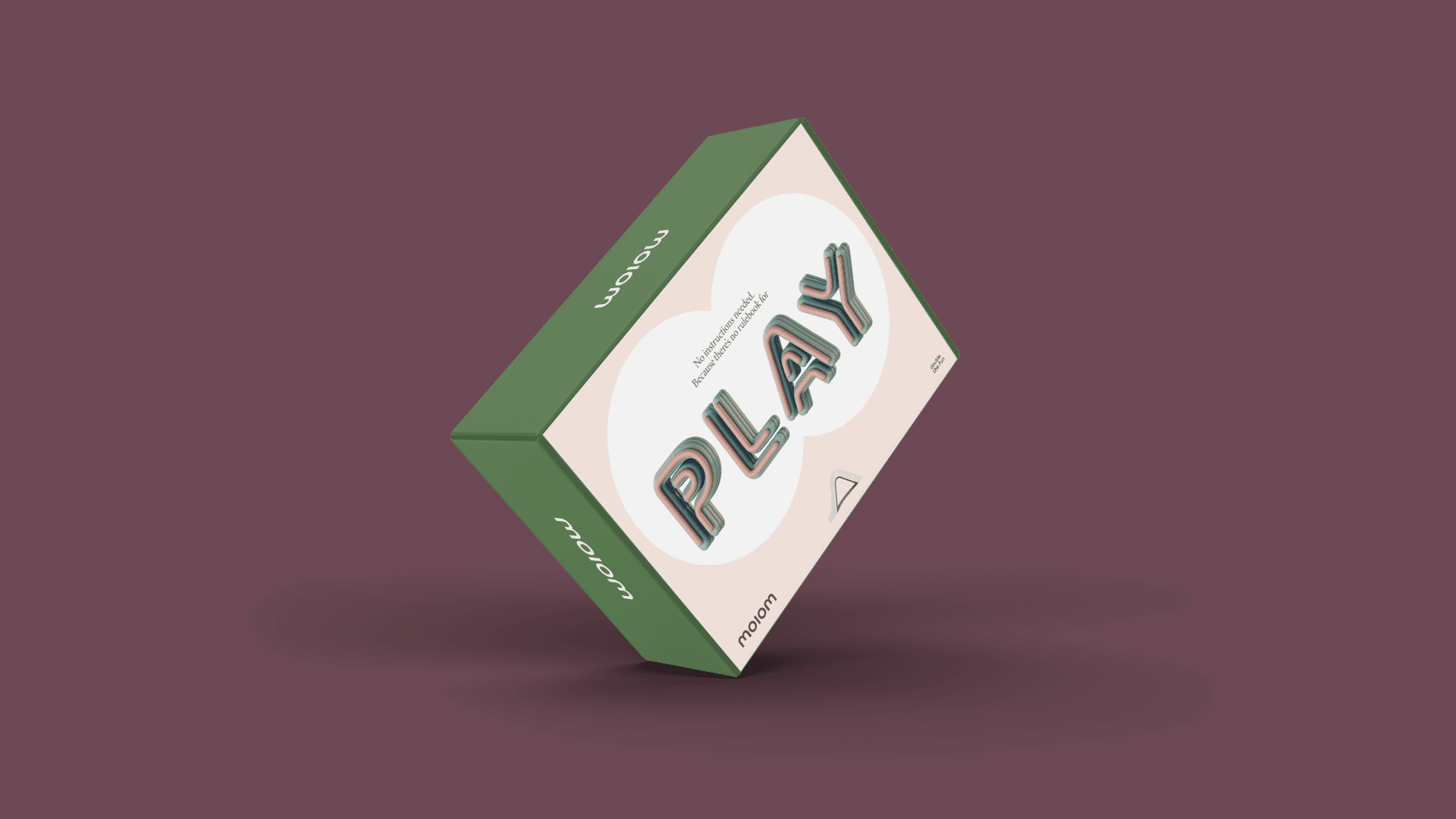 Green and cream tilted product box floating over maroon background, front labeled "PLAY" in bold retro lettering.