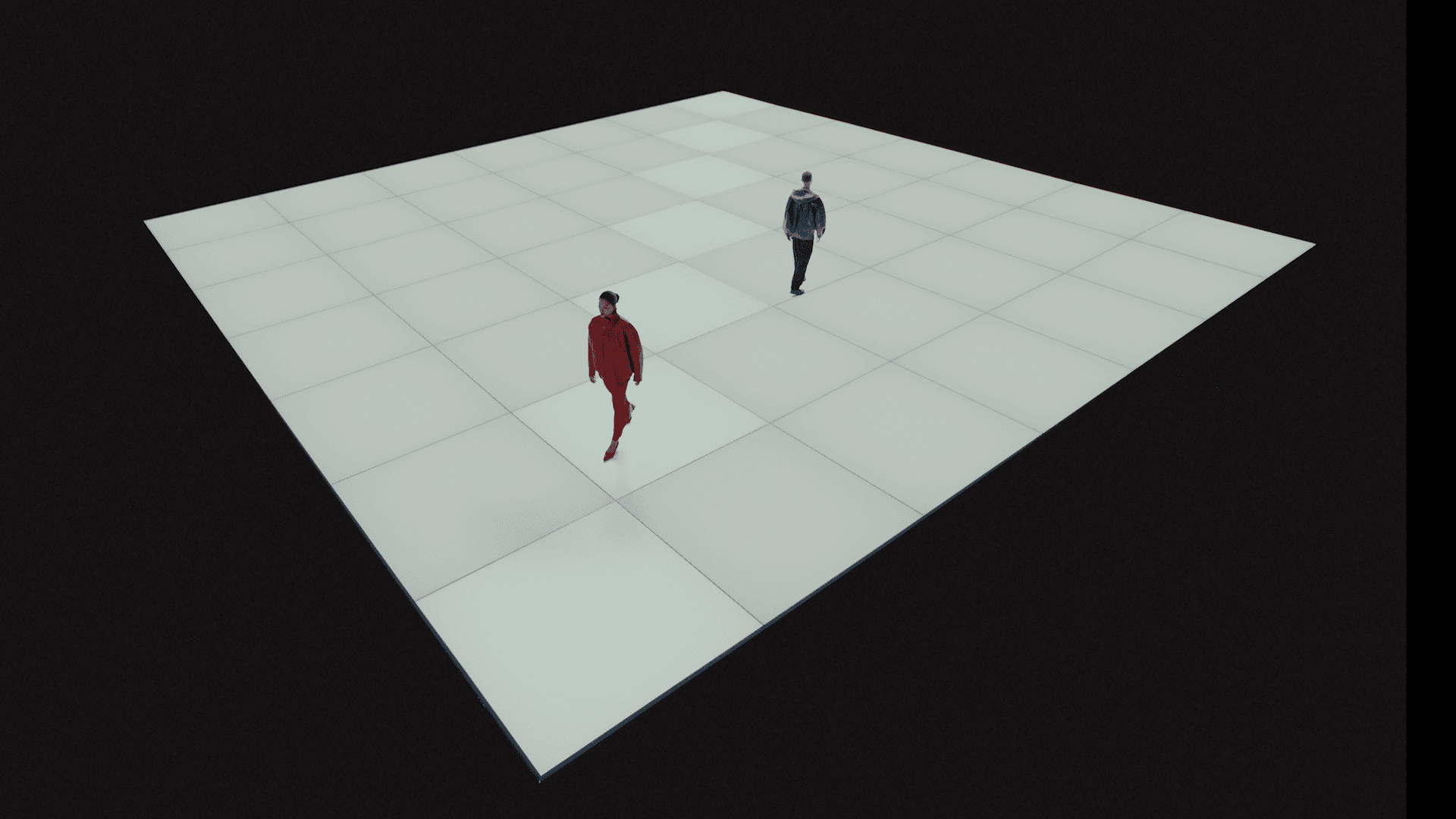 Two people walking on a large illuminated white grid floor against a dark background — one in a red suit, the other in a dark suit.