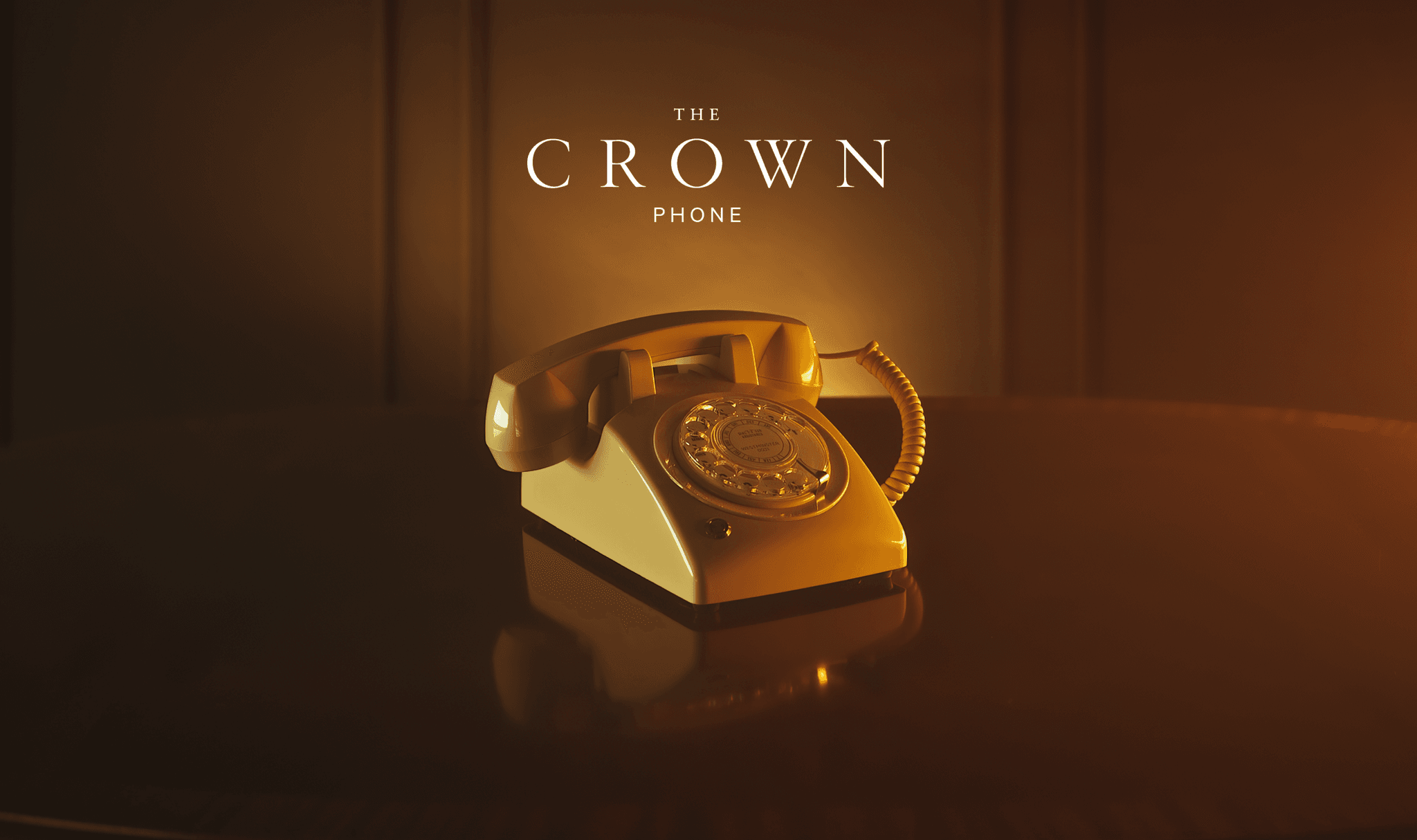 Gold vintage rotary telephone on a polished table under warm amber lighting; text 'The Crown Phone' above. This is the same rotary phone used across Netflix's The Crown show.