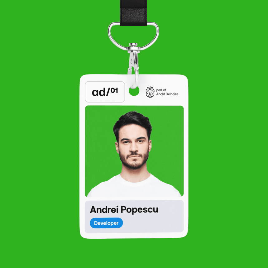 White ID ad01-branded badge on green background showing a portrait, name "Andrei Popescu" and a blue "Developer" role label.