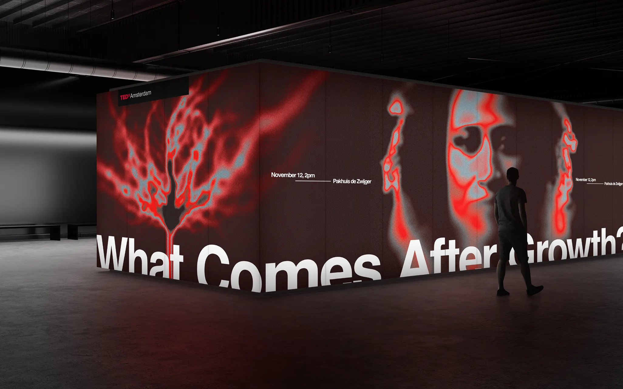 A dimly lit room with a large display featuring abstract red and blue art, the text "What Comes After Growth?" and event details for TEDxAmsterdam.